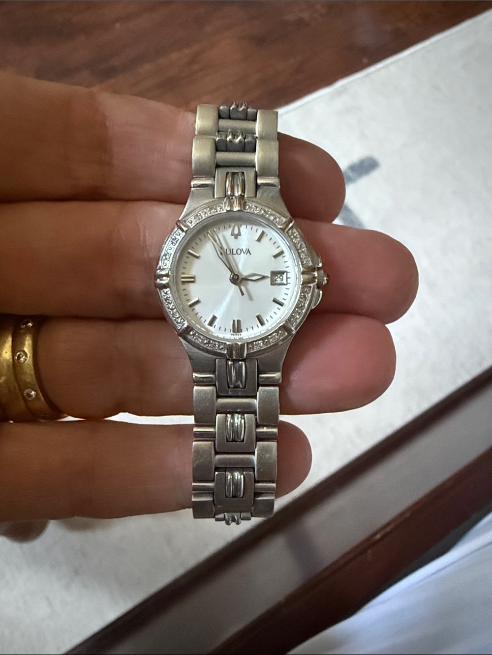 Bulova Women's Silver and White Stainless Steel Watch with 16 diamonds